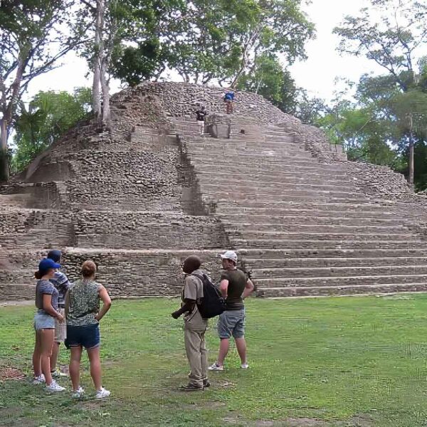 Archaeological Adventure Tour Belize - Authentic Travel Belize Travelers exploring a Maya archaeological site in Belize