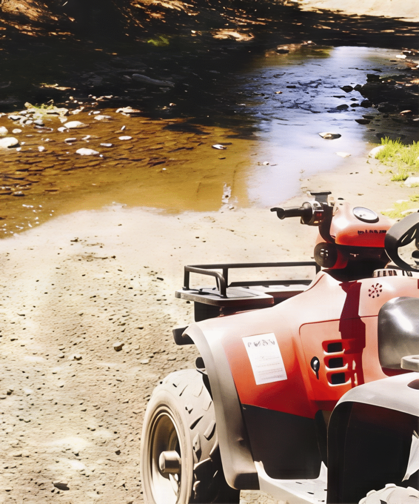 ATV parked at the edge of the rainforest, set for an exciting jungle ride on a Belize Adventure Tour.