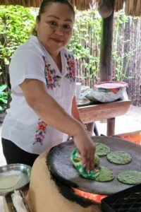 Making tortillas during the San Ignacio Food Tour