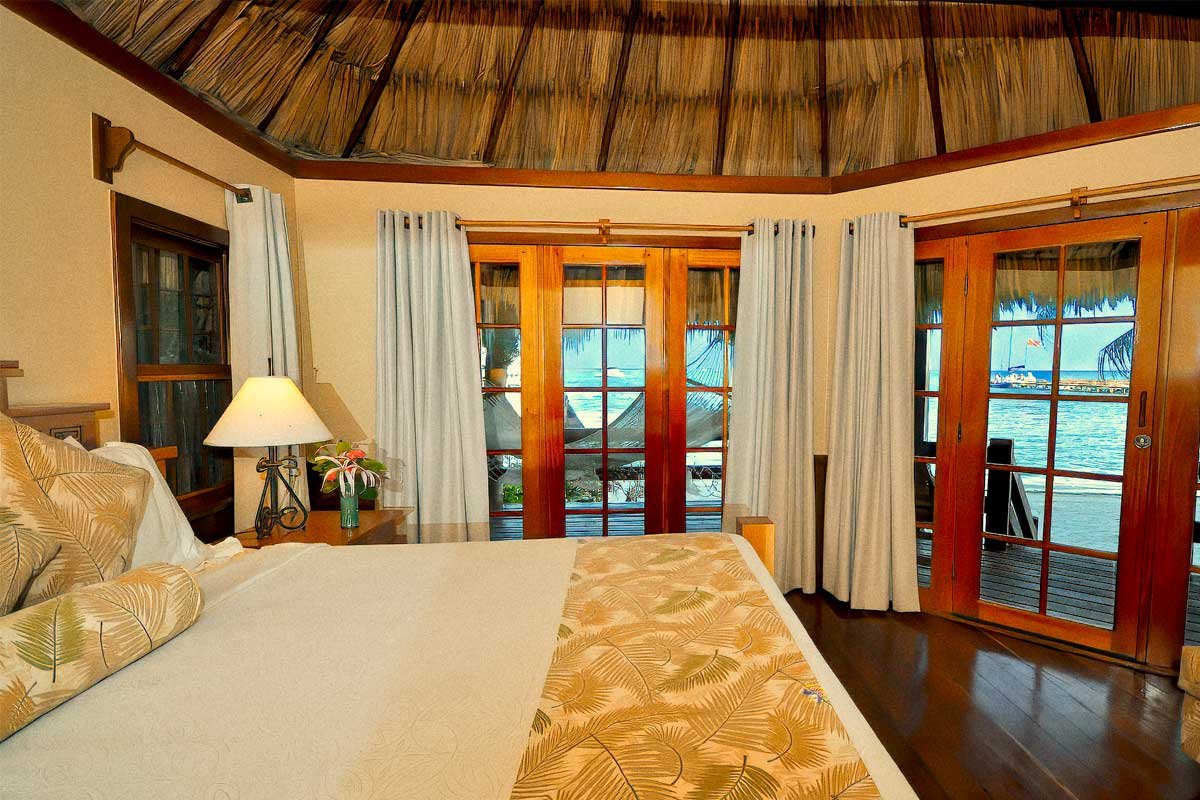 Spacious Ramon's Village room with private balcony and lush Caribbean Sea views — a top choice among the best all-inclusive resorts in Ambergris Caye.