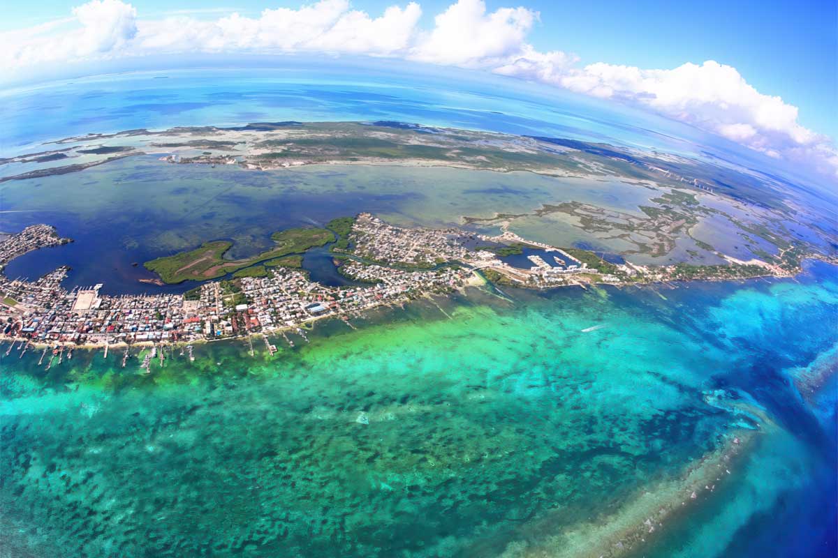 Aerial view of San Pedro Ambergris Caye surrounded by the turquoise Caribbean Sea and Belize Barrier Reef